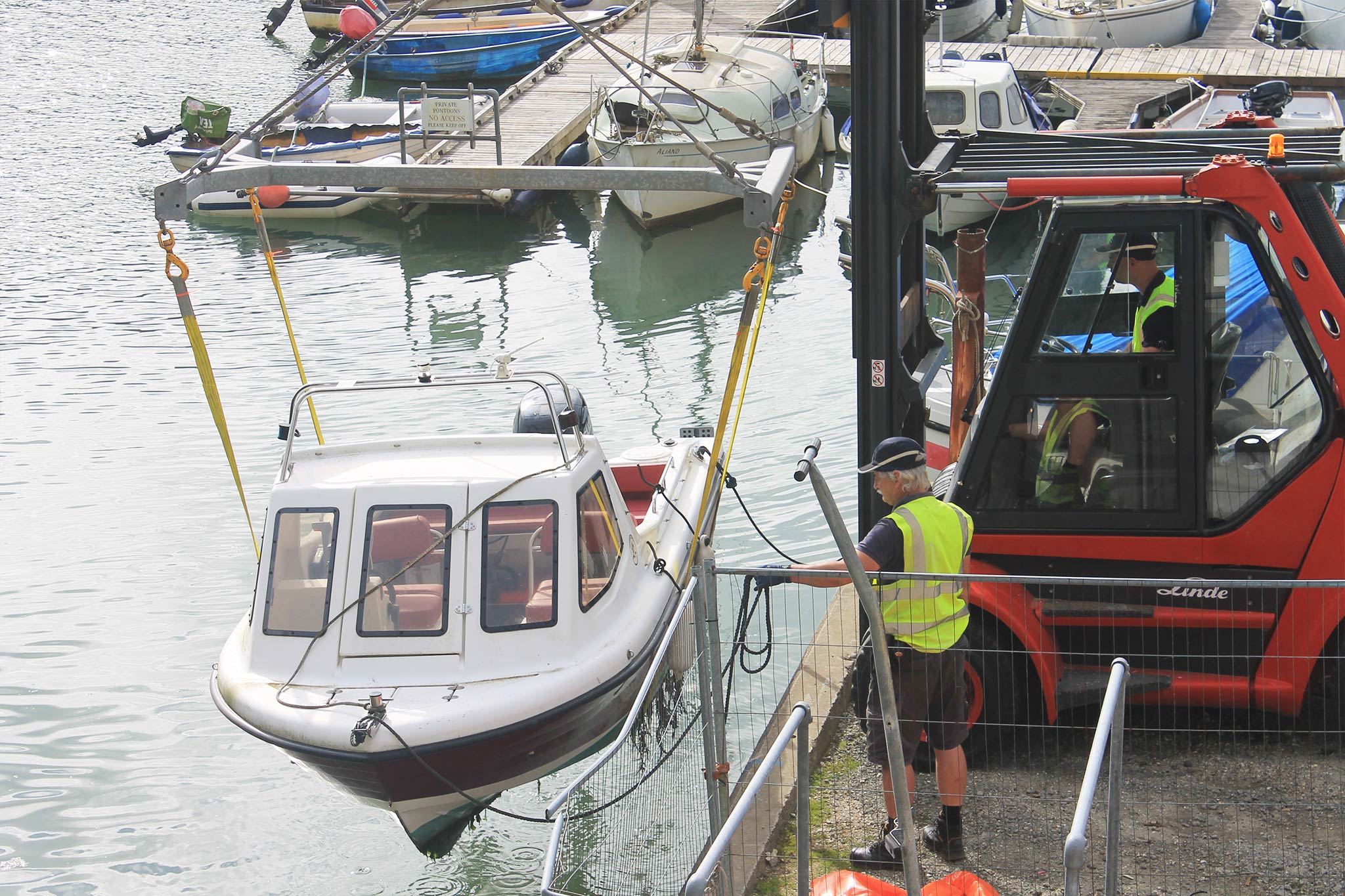 Lifting a boat out of the River at Truro Boat Services