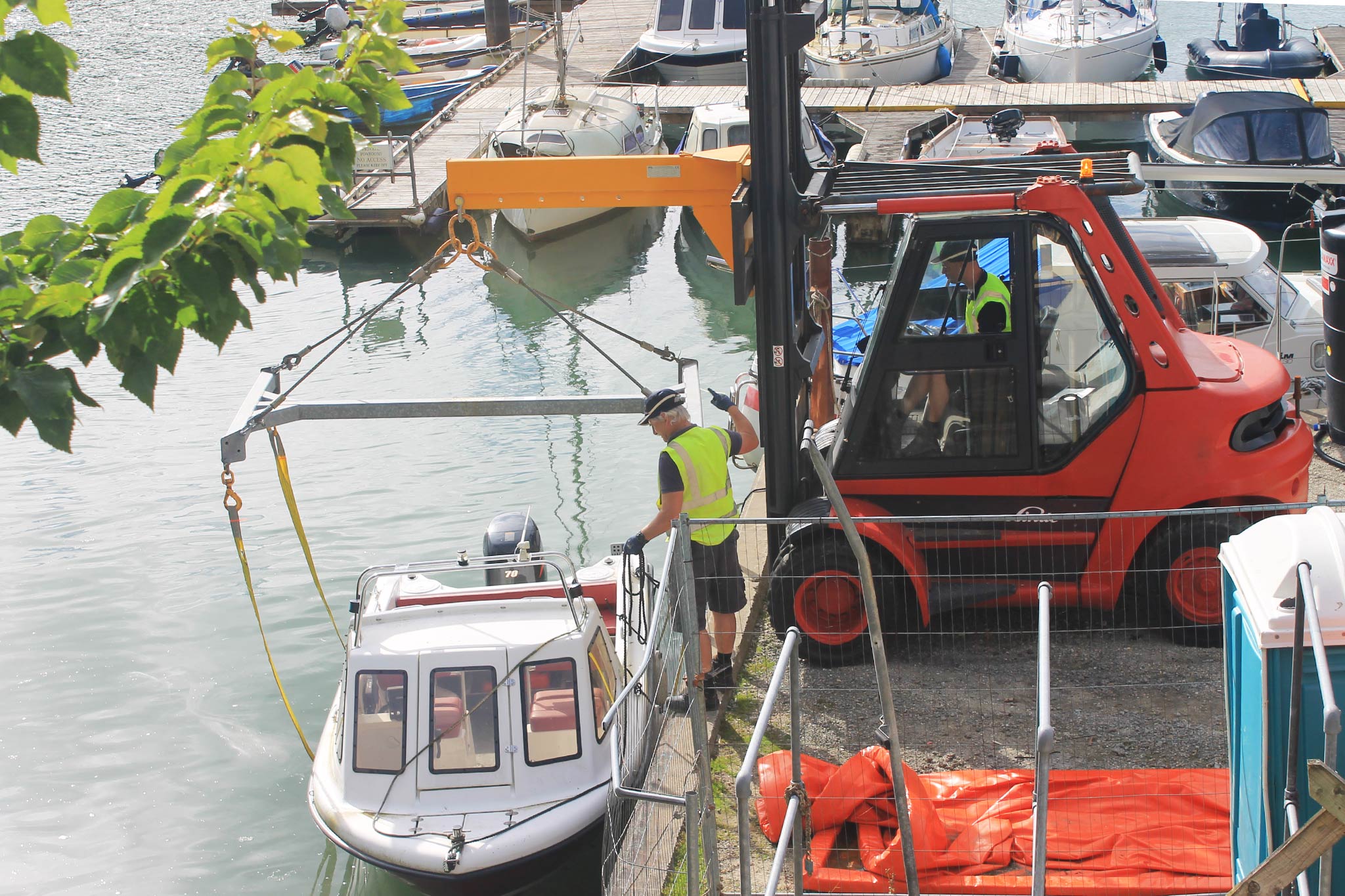 Lifting a boat for cleaning at Truro Boat Services, Malpas, Cornwall
